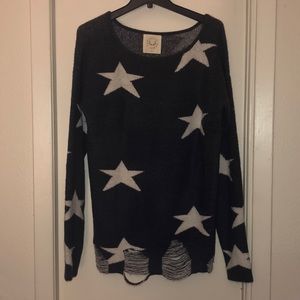 Distressed star sweater